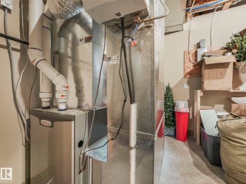 Utility room featuring heating unit - 117 Mcdowell Wynd, Leduc, AB - Indoor Photo Showing Basement