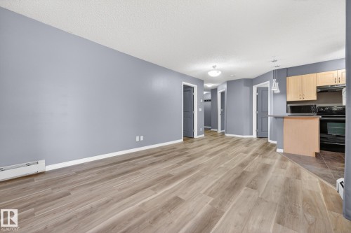 102 11445 Ellerslie Road Sw, Edmonton, AB - Indoor Photo Showing Kitchen