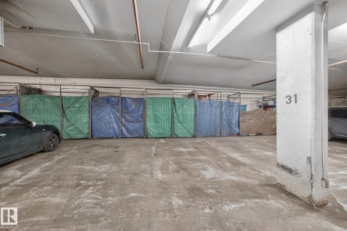 102 11445 Ellerslie Road Sw, Edmonton, AB - Indoor Photo Showing Garage