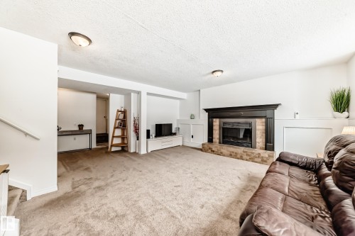 5 Dillon Place, St. Albert, AB - Indoor Photo Showing Living Room With Fireplace