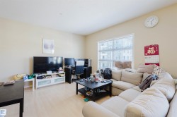 Living area featuring wood finished floors - 