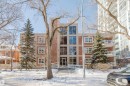 Snow covered building with a view of apartment building / complex - 207 9910 111 Street, Edmonton, AB  - Outdoor With Facade 
