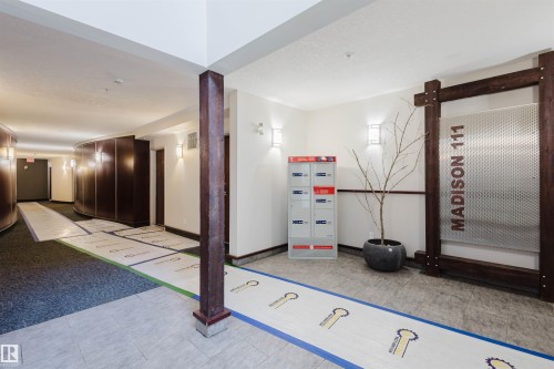 View of common area - 207 9910 111 Street, Edmonton, AB - Indoor Photo Showing Other Room
