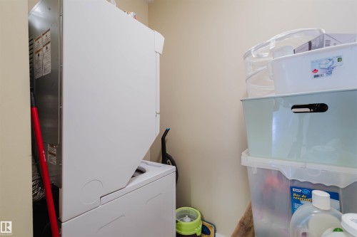 Laundry room featuring heating unit - 207 9910 111 Street, Edmonton, AB - Indoor