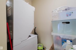 Laundry room featuring heating unit - 