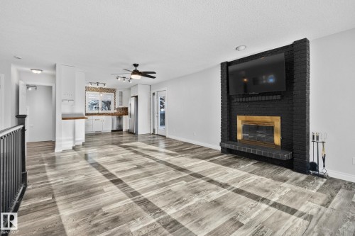 23 Larkspur Crescent, St. Albert, AB - Indoor Photo Showing Living Room With Fireplace