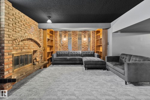 23 Larkspur Crescent, St. Albert, AB - Indoor Photo Showing Living Room With Fireplace