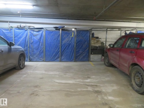 View of parking garage - 415 2590 Anderson Way, Edmonton, AB - Indoor Photo Showing Garage