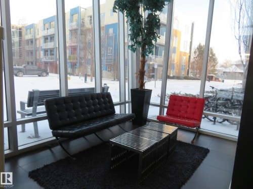Building lobby featuring expansive windows - 415 2590 Anderson Way, Edmonton, AB - Indoor Photo Showing Other Room