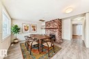 7809 116 Street, Edmonton, AB  - Indoor Photo Showing Dining Room With Fireplace 
