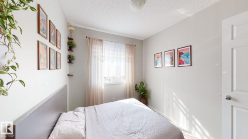 Bedroom featuring a textured ceiling - 1275 Chappelle Boulevard, Edmonton, AB - Indoor Photo Showing Bedroom