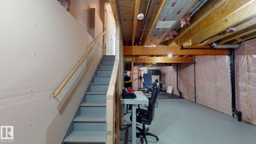 Stairway featuring concrete floors - 1275 Chappelle Boulevard, Edmonton, AB - Indoor Photo Showing Basement
