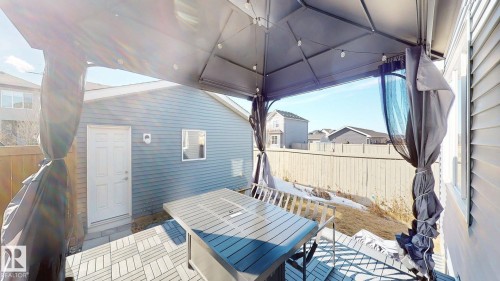 View of patio / terrace with a gazebo and outdoor dining space - 1275 Chappelle Boulevard, Edmonton, AB - Outdoor With Exterior