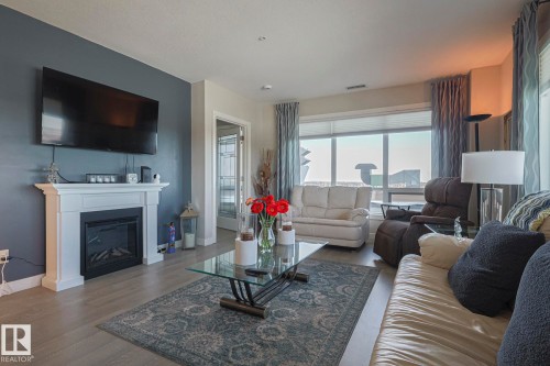 910 2755 109 Street, Edmonton, AB - Indoor Photo Showing Living Room With Fireplace