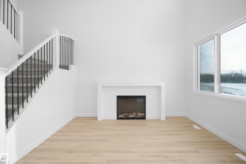 1535 11 Avenue, Edmonton, AB - Indoor Photo Showing Other Room With Fireplace