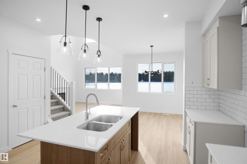 1535 11 Avenue, Edmonton, AB - Indoor Photo Showing Kitchen With Double Sink