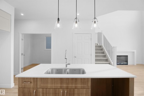 1535 11 Avenue, Edmonton, AB - Indoor Photo Showing Kitchen With Double Sink