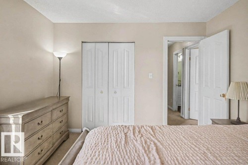 82 Erie Street S, Devon, AB - Indoor Photo Showing Bedroom