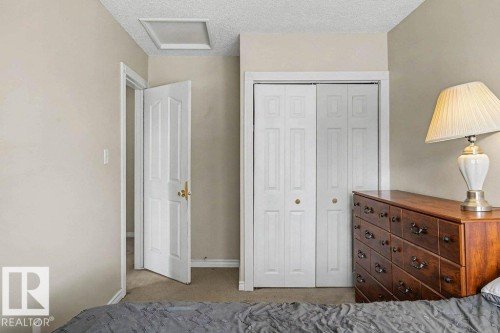 82 Erie Street S, Devon, AB - Indoor Photo Showing Bedroom
