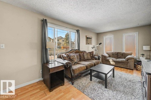 82 Erie Street S, Devon, AB - Indoor Photo Showing Living Room
