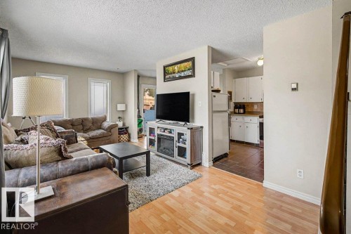 82 Erie Street S, Devon, AB - Indoor Photo Showing Living Room