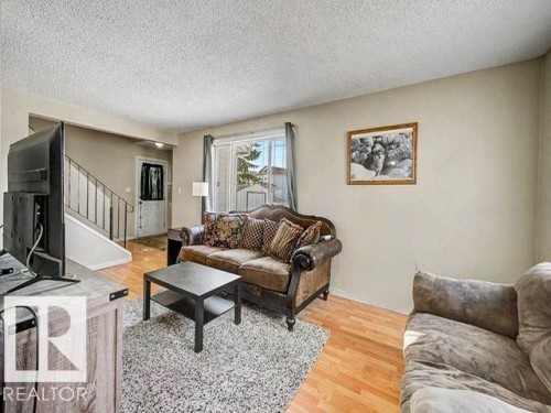 82 Erie Street S, Devon, AB - Indoor Photo Showing Living Room