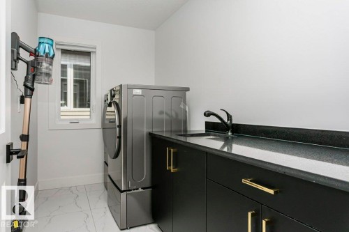839 34 Av, Edmonton, AB - Indoor Photo Showing Laundry Room