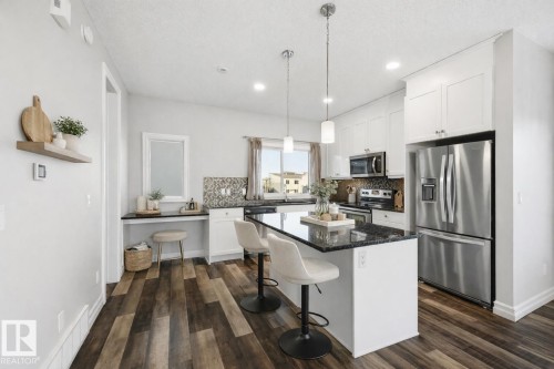 Virtually staged kitchen - 10 804 Welsh Drive, Edmonton, AB - Indoor Photo Showing Kitchen With Stainless Steel Kitchen With Upgraded Kitchen