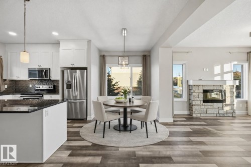 Virtually staged dining nook - 10 804 Welsh Drive, Edmonton, AB - Indoor Photo Showing Kitchen With Stainless Steel Kitchen With Upgraded Kitchen