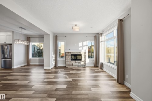 10 804 Welsh Drive, Edmonton, AB - Indoor Photo Showing Other Room With Fireplace