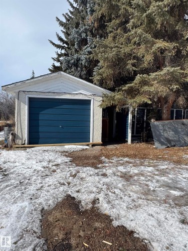 View of snow covered garage - 4801 52 Avenue, Andrew, AB - Outdoor
