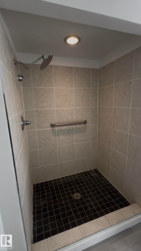 Bathroom featuring a stall shower and recessed lighting - 4801 52 Avenue, Andrew, AB - Indoor Photo Showing Bathroom