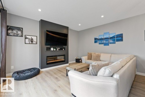20008 18 Avenue, Edmonton, AB - Indoor Photo Showing Living Room With Fireplace