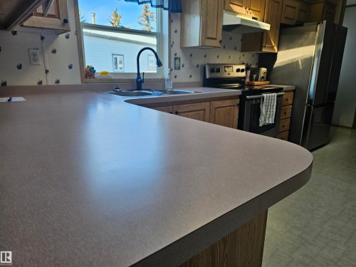 94 4819 51 Ave, Millet, AB - Indoor Photo Showing Kitchen With Double Sink