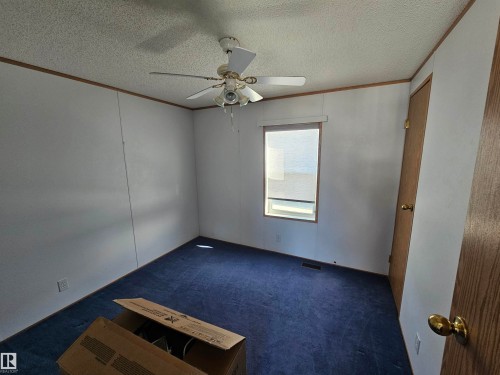 94 4819 51 Ave, Millet, AB - Indoor Photo Showing Other Room