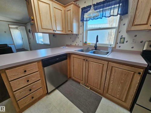 94 4819 51 Ave, Millet, AB - Indoor Photo Showing Kitchen With Double Sink