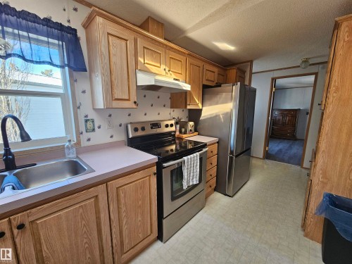 94 4819 51 Ave, Millet, AB - Indoor Photo Showing Kitchen With Double Sink