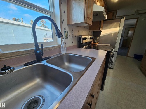 94 4819 51 Ave, Millet, AB - Indoor Photo Showing Kitchen With Double Sink