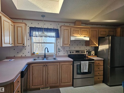94 4819 51 Ave, Millet, AB - Indoor Photo Showing Kitchen With Double Sink