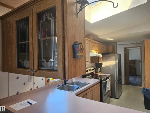 94 4819 51 Ave, Millet, AB - Indoor Photo Showing Kitchen With Double Sink