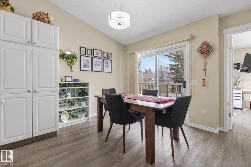 Dining space featuring light wood-style flooring and baseboards - 30 4 Heritage Way, St. Albert, AB - Indoor Photo Showing Dining Room