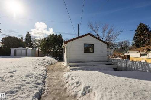 Fenced yard with two sheds and single detached garage. - 4209 116 Avenue, Edmonton, AB - Outdoor