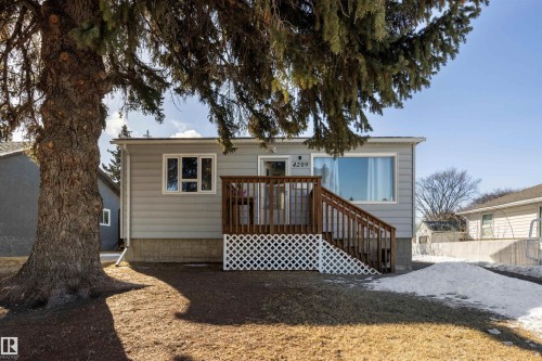 Front of house featuring a wooden deck - 4209 116 Avenue, Edmonton, AB - Outdoor