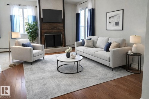 202 10826 113 Street Nw, Edmonton, AB - Indoor Photo Showing Living Room With Fireplace