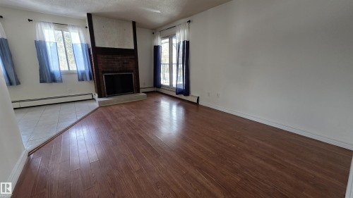 202 10826 113 Street Nw, Edmonton, AB - Indoor With Fireplace