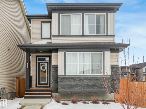 View of front of house featuring brick siding - 1404 Podersky Link, Edmonton, AB - Outdoor