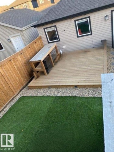 View of wooden terrace, captured during summer - 1404 Podersky Link, Edmonton, AB - Outdoor With Exterior