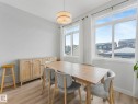 Dining room with light wood finished floors and baseboards - 1404 Podersky Link, Edmonton, AB  - Indoor Photo Showing Dining Room 