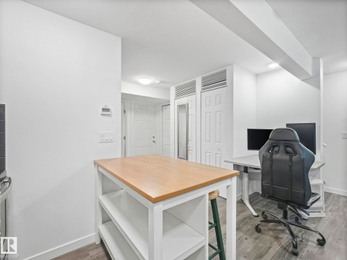 Office with light wood finished floors and baseboards - 1404 Podersky Link, Edmonton, AB - Indoor Photo Showing Office