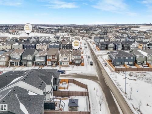 Snowy aerial view featuring a residential view - 1404 Podersky Link, Edmonton, AB - Outdoor With View